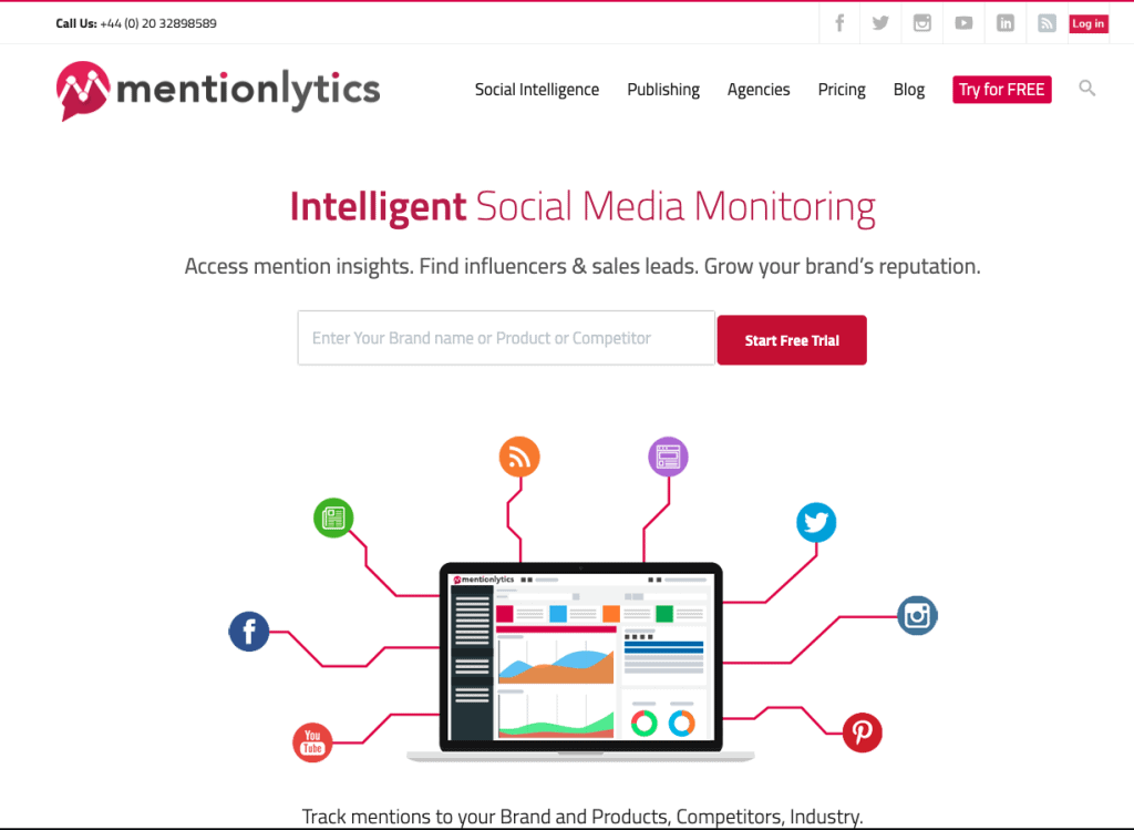  A web page of a social media monitoring tool with the headline 'Intelligent Social Media Monitoring', showing a laptop in the center with social media and other icons around it, and a search bar at the top.